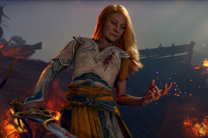god-of-war-laufey-with-first-look-trailer-news Faye from God of War Laufey wielding a sword with sparks flaming from her hand.