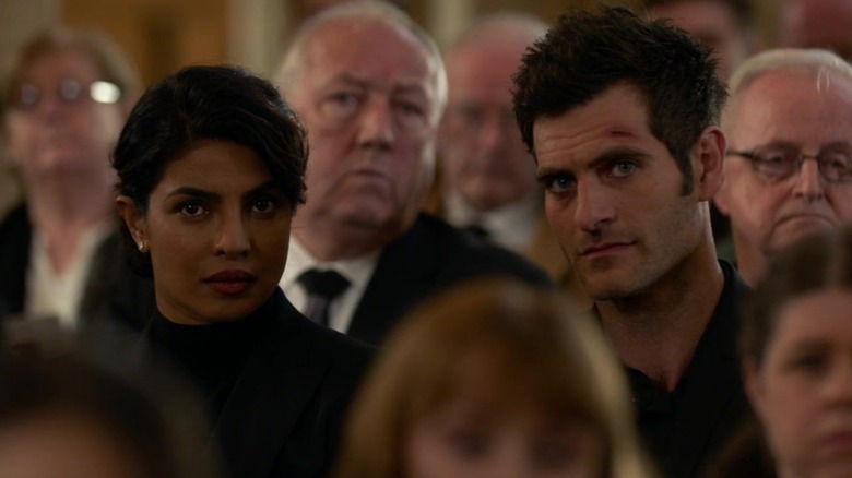 Alex Parrish and Mike Powell at a funeral in Quantico (2015)