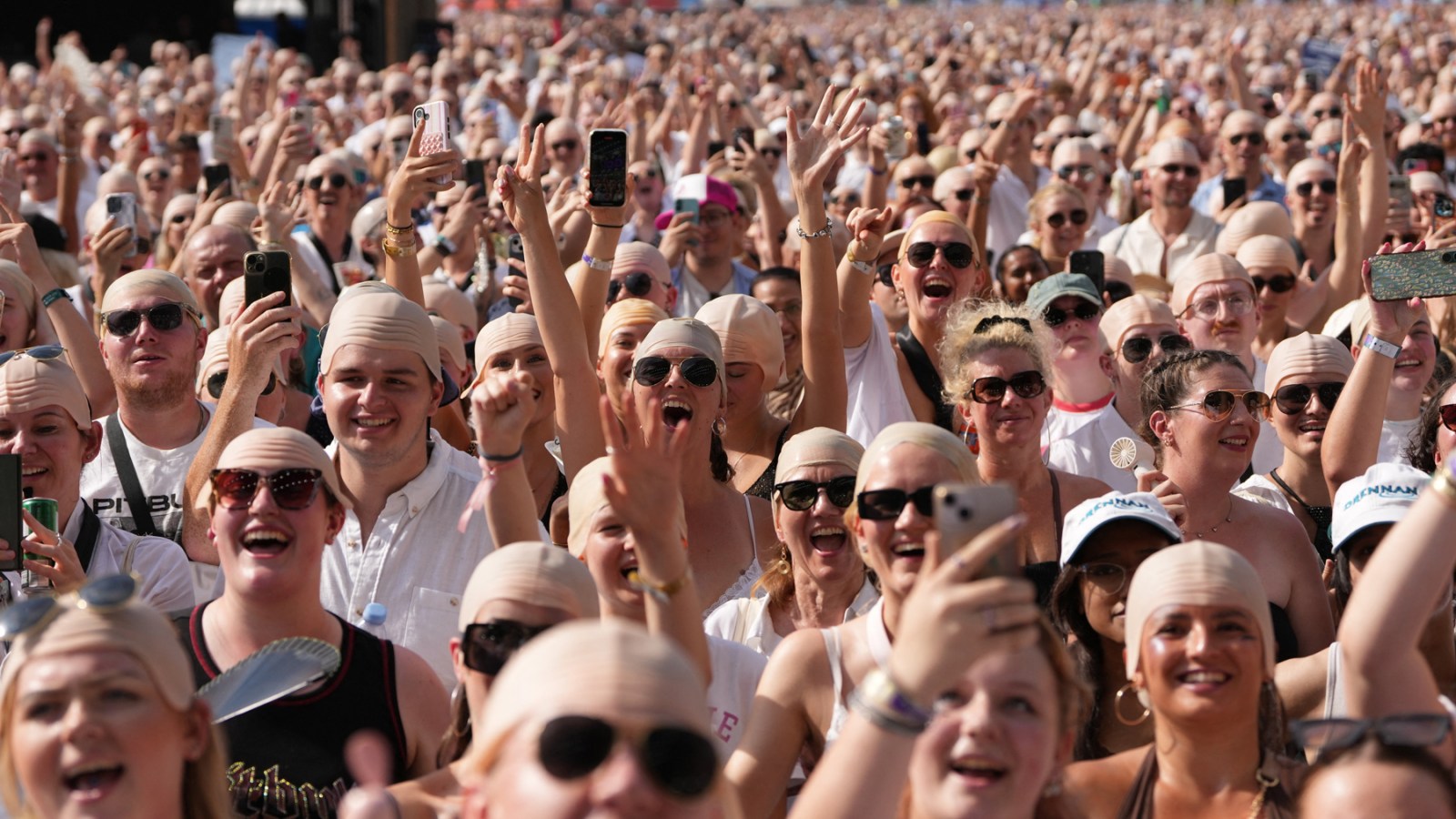 Pitbull Sets Guinness World Record for Most Bald Caps