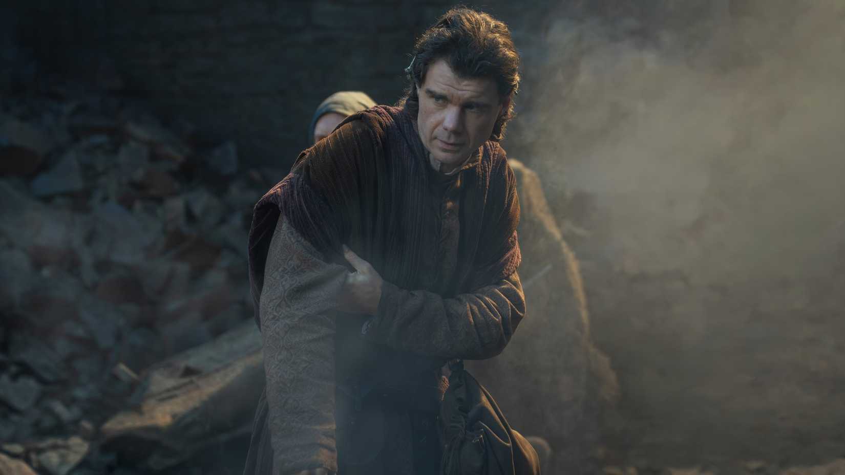 Larys Strong (Matthew Needham) leans on his cane and looks worried in House of the Dragon season 3 episode 4. 