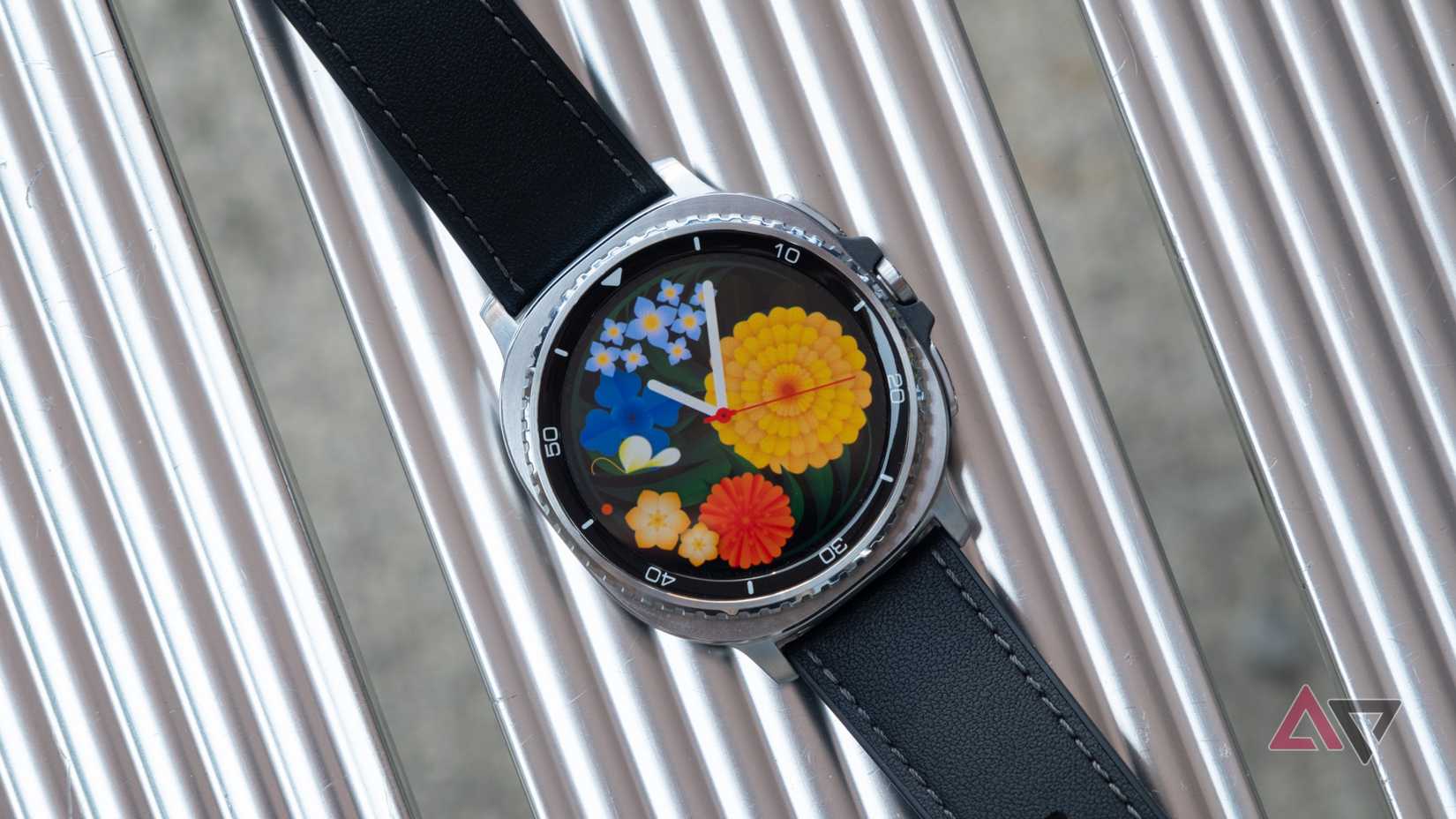 The Samsung Galaxy Watch 8 Classic with a floral face