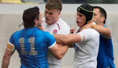 England's Tommy Freeman, center, argues with Argentina's Mateo Carreras (11) during a Nations Championship rugby match in Santiago Del Estero, Argentina, Saturday, July 18, 2026. (AP Photo/Gustavo Garello)