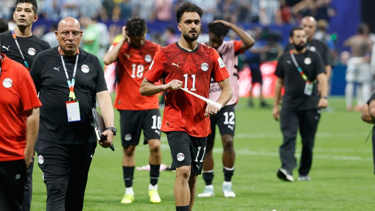 Egypt's Mostafa Zico walks off the pitch after losing to Argentina