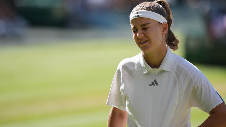 Karolina Muchova of Czech Republic reacts after losing a point against Linda Noskova of Czech Republic in the women's singles final at Wimbledon Tennis Championships in London, Saturday, July 11, 2026. (AP Photo/Kin Cheung)