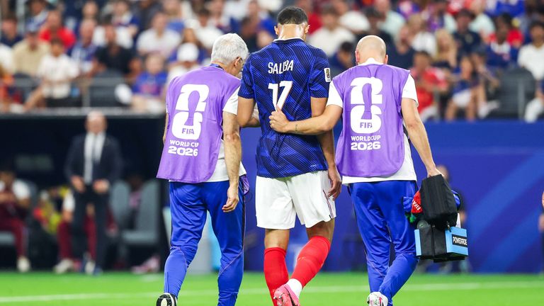 July 14, 2026, Arlington, Tx, United States: William Saliba player of France receives treatment for an apparent injury and is substituted during the FIFA World Cup semifinal match between France and Spain, at Dallas Stadium, in Texas, United States, on Tuesday, July 14, 2026. (Cal Sport Media via AP Images)