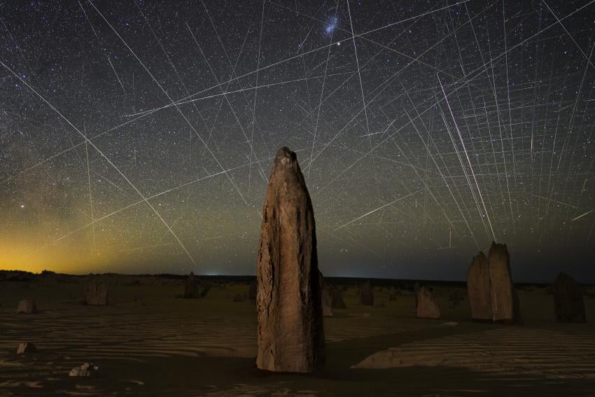Image of the Australian desert showing the growing light pollution caused by artificial satellites. Credit: Joshua Rozells