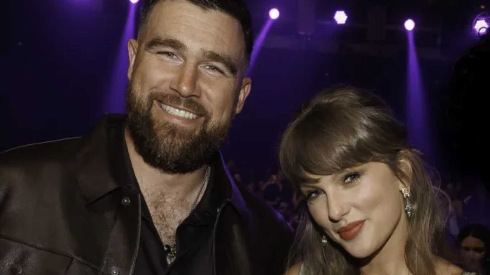 Travis Kelce and Taylor Swift Posing and Smiling Together