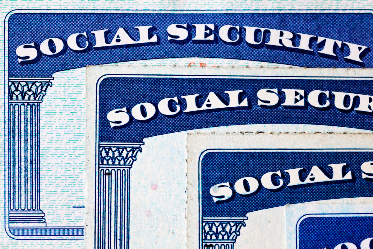 Social Security cards on top of each other.