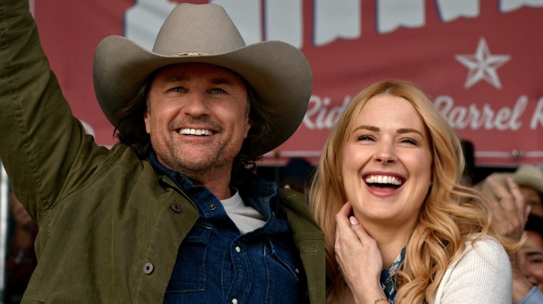 Jack Sheridan and Melinda Monroe with big smiles at the rodeo in Virgin River