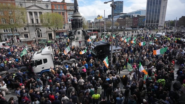 Protesters listen to speeches on O'Connell Street in Dublin