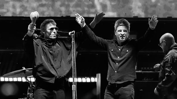 Liam Gallagher, Noel Gallagher of Oasis perform onstage at the Oasis Live '25 World Tour