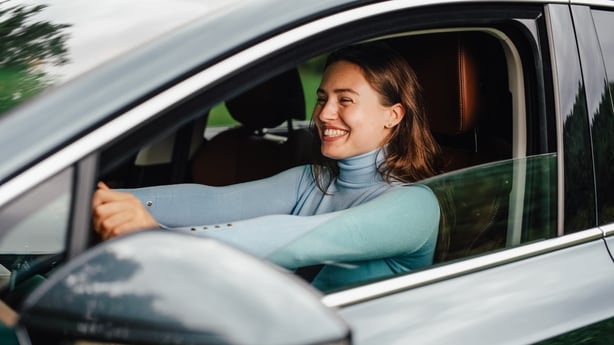 Young woman buying her first car.