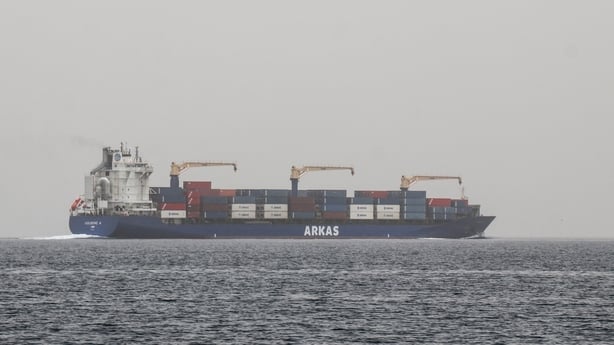 A commercial vessel passes through an international shipping lane off Yemen's Hanish Island in the Red Sea