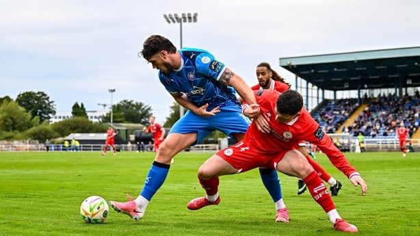 Ali Coote of Shelbourne in action against Kevin Long of Waterford during the SSE Airtricity Men's Premier Division match between Waterford and Shelbourne at the RSC in Waterford
