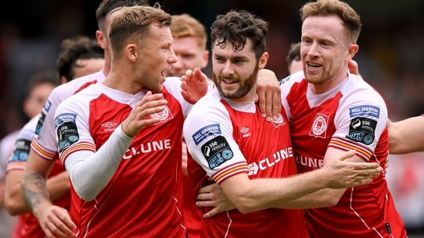 Dublin , Ireland - 2 August 2026; Aidan Keena of St Patrick's Athletic celebrates with team-mates Jamie Lennon, left, and Sean Hoare, right, after scoring their side's first goal during the SSE Airtricity Men's Premier Division match between St Patrick's Athletic and Derry City at Richmond Park in D