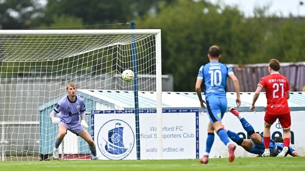 Waterford , Ireland - 2 August 2026; Tommy Lonergan of Waterford, right, heads to score his side's first goal as Shelbourne goalkeeper Eddie Beach attempts to make a save during the SSE Airtricity Men's Premier Division match between Waterford and Shelbourne at the RSC in Waterford. (Photo By Tyler 