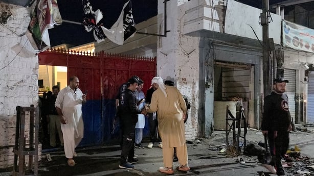 Police officials inspect the site following a suicide bombing during a protest in Pakistan's Swat district on August 2, 2026. A suicide bomber attacked a busy area near a police station during a protest in northern Pakistan's Swat district, killing seven people and wounding more than 20, police said