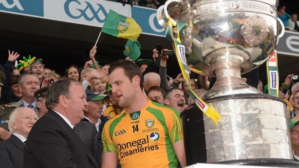 23 September 2012; Donegal captain Michael Murphy shakes hands with Uachtar�n Chumann L�thchleas Gael Liam � N�ill while Michael D. Higgins, President of Ireland looks on, before the presentation of the Sam Maguire Cup. GAA Football All-Ireland Senior Championship Final, Donegal v Mayo, Croke Park,