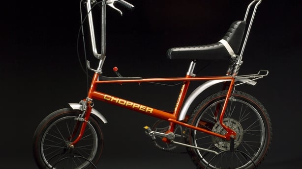A red vintage Raleigh Chopper Bike