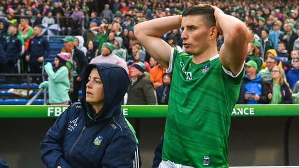 Tipperary , Ireland - 5 June 2022; Gearoid Hegarty of Limerick and performance psychologist Caroline Currid watch the closing moments of extra time in the Munster GAA Hurling Senior Championship Final match between Limerick and Clare at FBD Semple Stadium in Thurles, Tipperary. (Photo By Brendan Mor