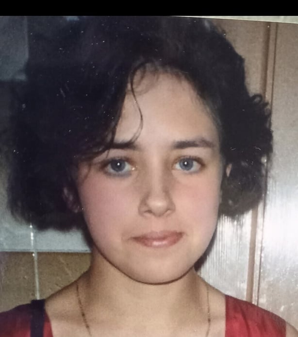 A girl posing for a picture