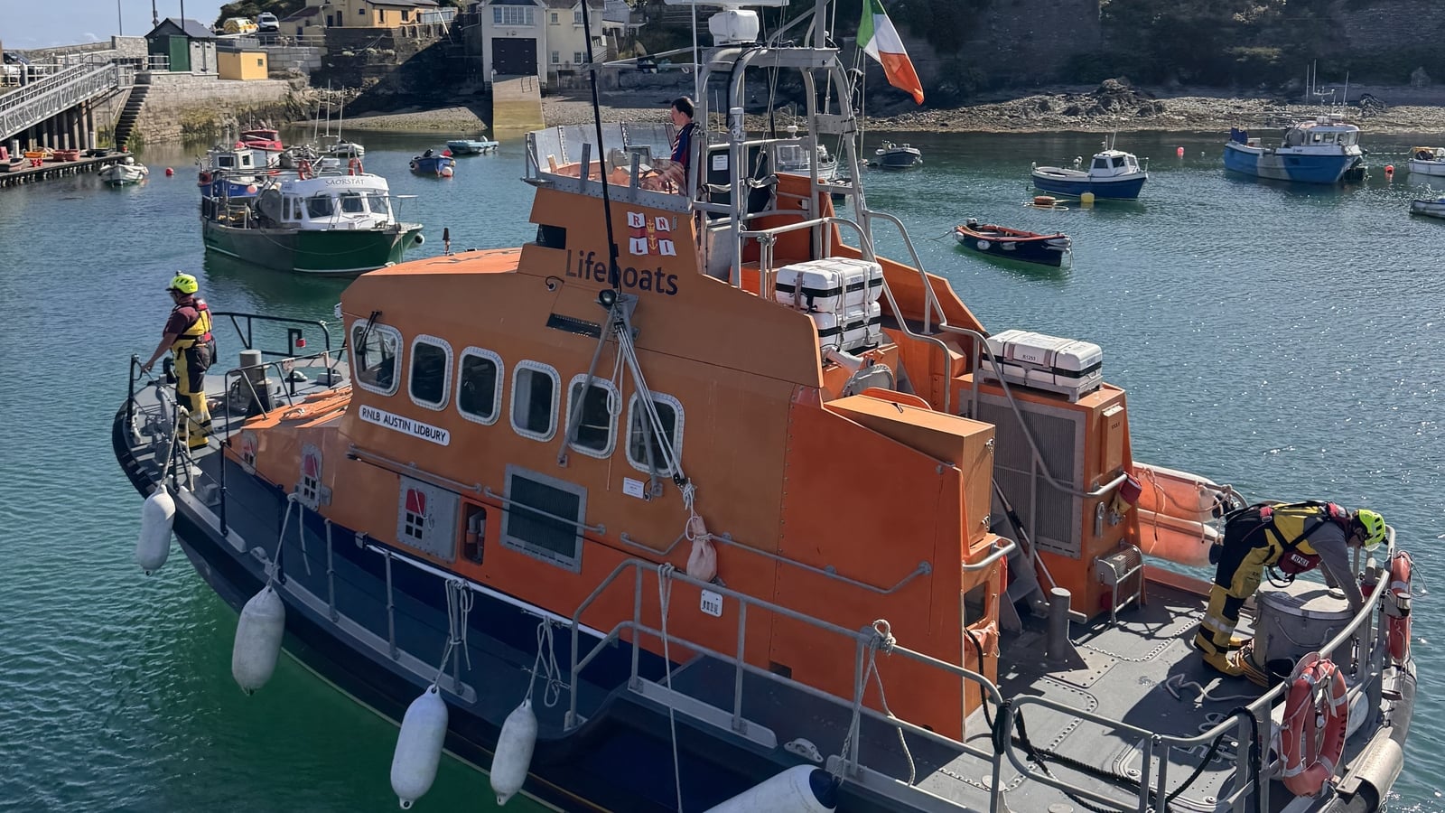Four people rescued after fishing boat takes on water