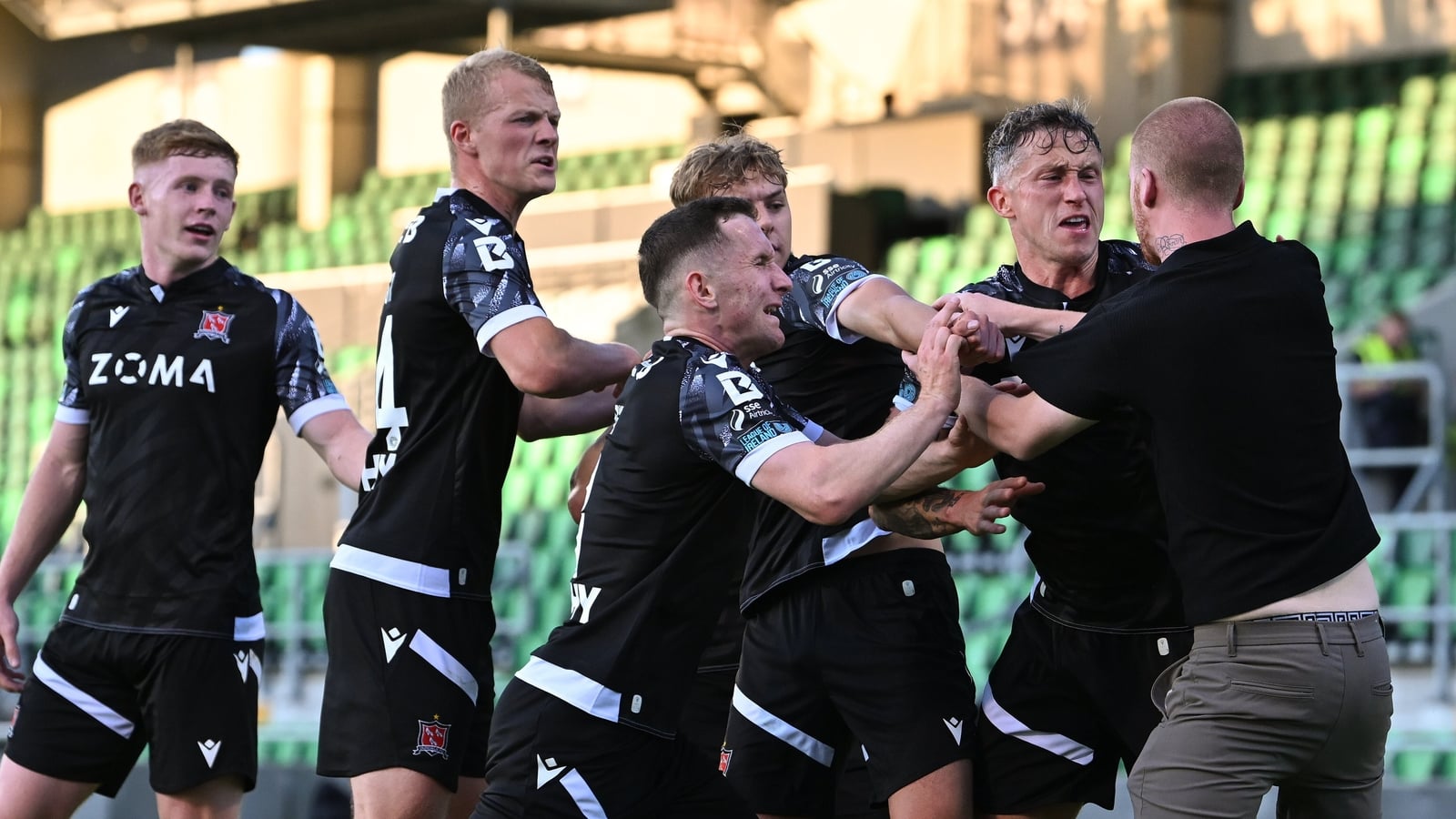 Hoops' wild defeat of Dundalk marred by fan confrontation