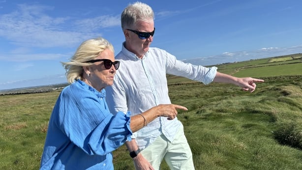  Mairéad Mason pointing out the raw sewage being discharged into the sea 