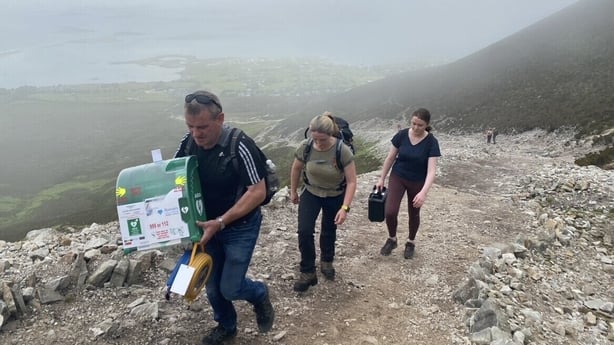 Darren Forde installing three defibrillators on Croagh Patrick in 2022