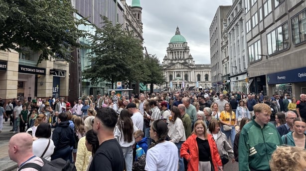 Members of the public watch performers at Fleadh Cheoil na hÉireann 2026, in Belfast