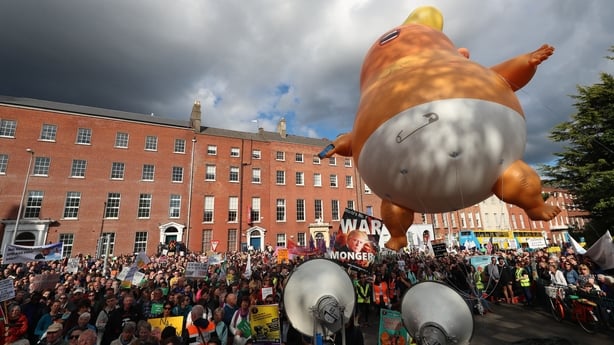 The Trump baby blimp is flown at the Garden of Remembrance in Dublin