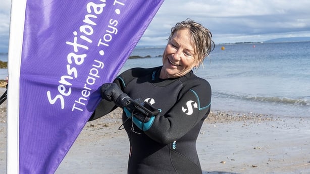 racy Piggott celebrates after completing Swimming in Silence, a gruelling 14km underwater endurance swim across Galway Bay, in record time, in aid of Sensational Kids