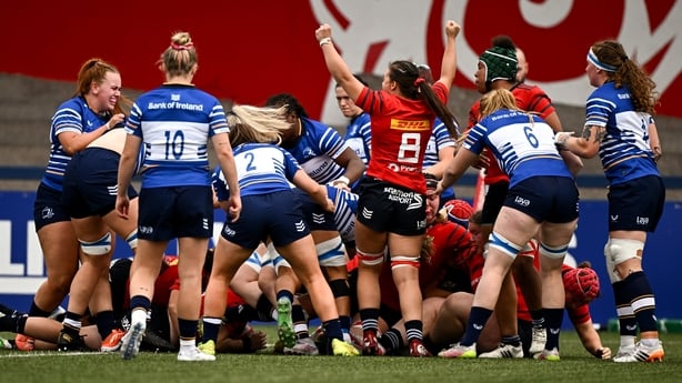 8 August 2026; Maeve Óg O'Leary of Munster, 8, celebrates her side's first try, scored by teammate Beth Buttimer, hidden, during the Vodafone Womens Interprovincial Championship Round 1 match between Munster and Leinster at Virgin Media Park in Cork. Photo by Seb Daly/Sportsfile