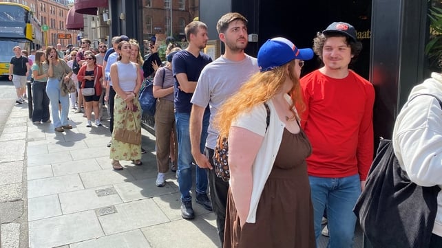 People queuing in George's Street in Dublin to buy specialist glasses to watch the eclipse