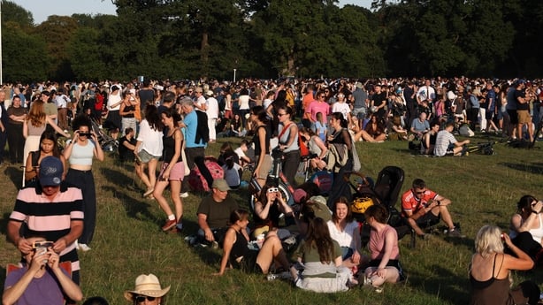 People watch the solar eclipse pictured in Phoenix Park, Dublin