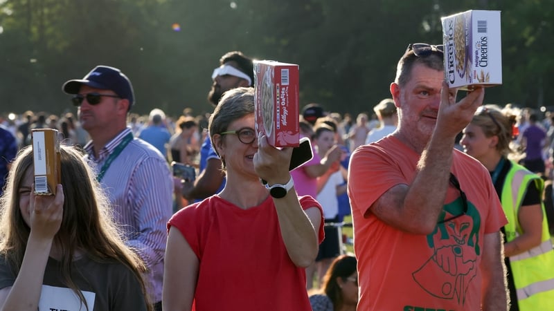 People watch the solar eclipse through cereal boxes in the Phoenix Park. Pic: Collins