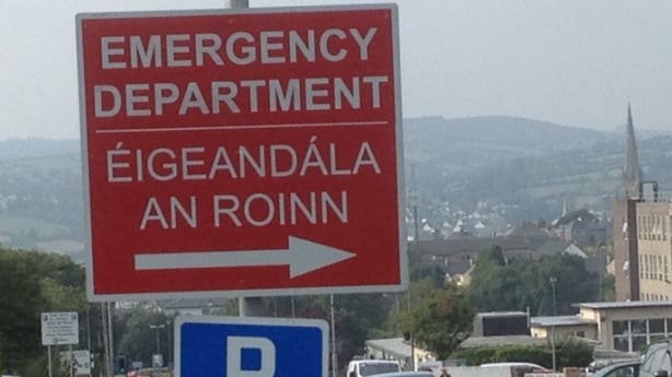 A road sign with inaccurate Gaeilge on it