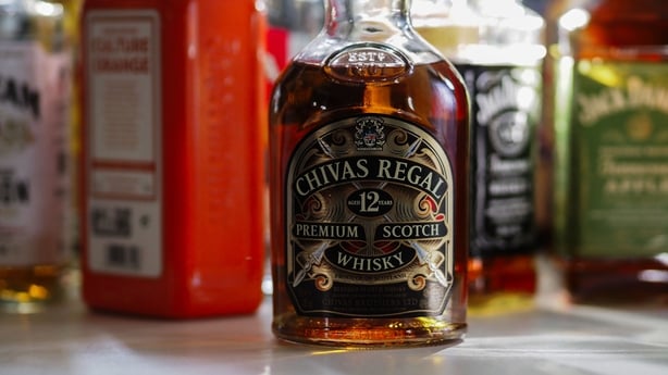 GERMANY - 2024/10/16: In this photo illustration, Chivas Regal 12 Years Old Blended Scotch Whiskey seen at the bar counter. Chivas Regal Scotch 12 Years Old is a whiskey made from carefully selected different malt and grain Scotch whiskies. (Photo Illustration by Igor Golovniov/SOPA Images/LightRock