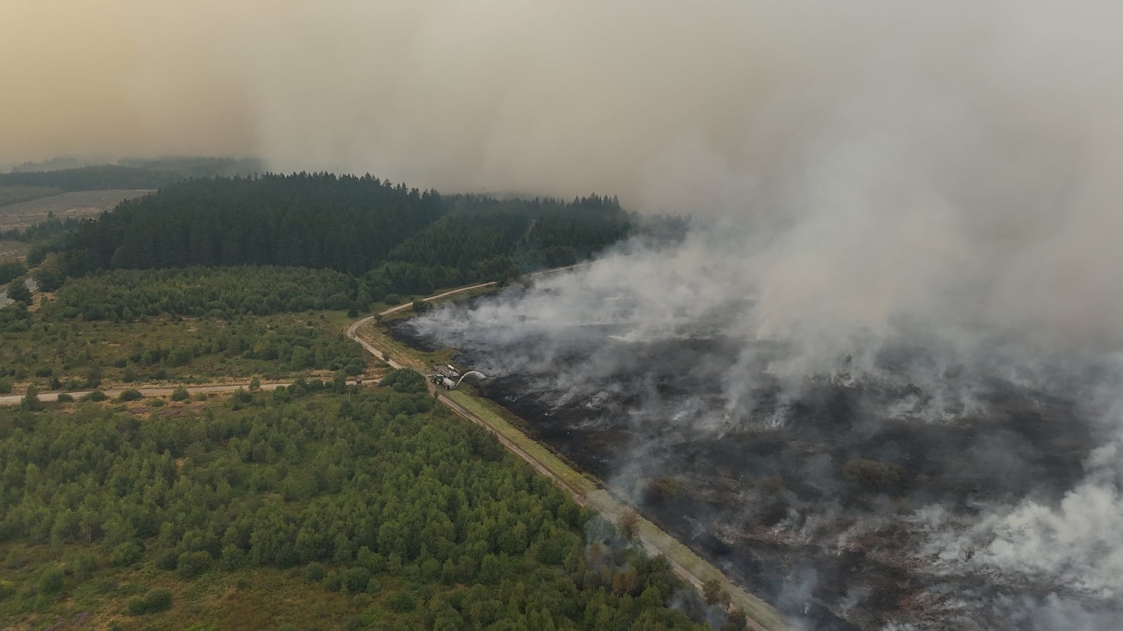 Two dead, hundreds evacuated from fires near Athens