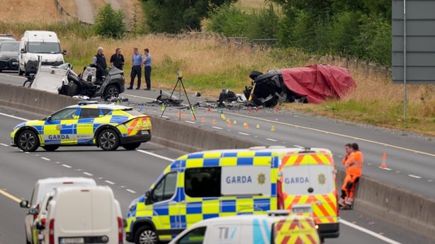 Suitcases by one of the vehicles at the scene on the M9 northbound at Junction 3 in Co Kildare