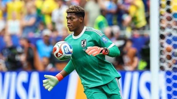 Japan goalkeeper Zion Suzuki (#1) chests the ball during the FIFA World Cup 26 Round of 32 match between Brazil and Japan on June 29, 2026 at Houston Stadium in Houston, TX.