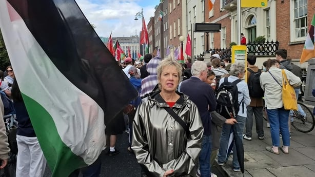 Around 200 people gathered outside the Department of Justice today to protest against the Government refusing visas for a group of Palestinian students hoping to take up scholarships at third-level institutions this academic year.