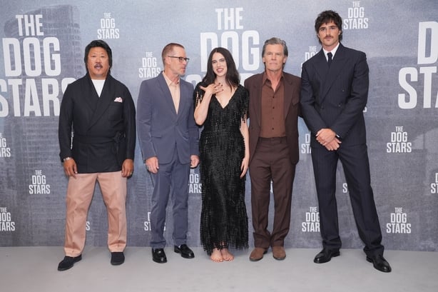 Cast of Dog Stars posing on red carpet of premiere