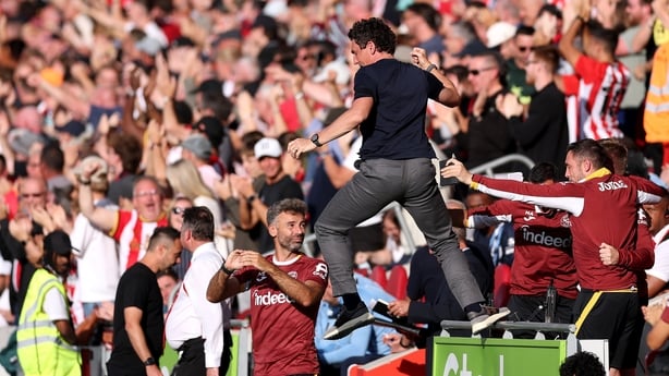 BRENTFORD, ENGLAND - AUGUST 22: Keith Andrews, Manager of Brentford celebrates with his coaching staff after the team's second goal, scored by Vitaly Janelt of Brentford (not pictured) during the Premier League 2026/27 match between Brentford and Tottenham Hotspur at Gtech Community Stadium on Augus