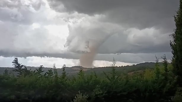 video grab taken from Villefloure, shows a tornado hitting Pomas, southwestern France