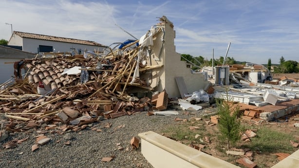 debris of a destroyed house following a tornado