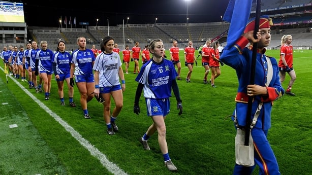 16 December 2023; Aileen Wall of Ballymacarbry leads her team-mates in the parade before the Currentaccount.ie LGFA All-Ireland Senior Club Championship final match between Ballymacarby of Waterford and Kilkerrin-Clonberne of Galway at Croke Park in Dublin. Photo by Piaras Ó Mídheach/Sportsfile 