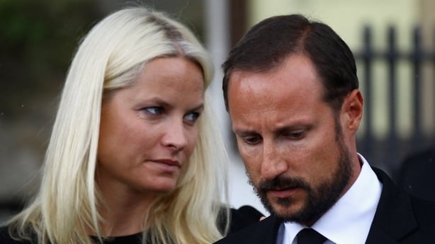 OSLO, NORWAY - JULY 24: Crown Prince Haakon and Crown Princess Mette-Marit attend a memorial service at Smmerapen Norderhov kirke, following yesterdays twin extremist attacks, on July 24, 2011 in Oslo, Norway. A man named as Anders Behring Breivik has been arrested and is being held as the primary s