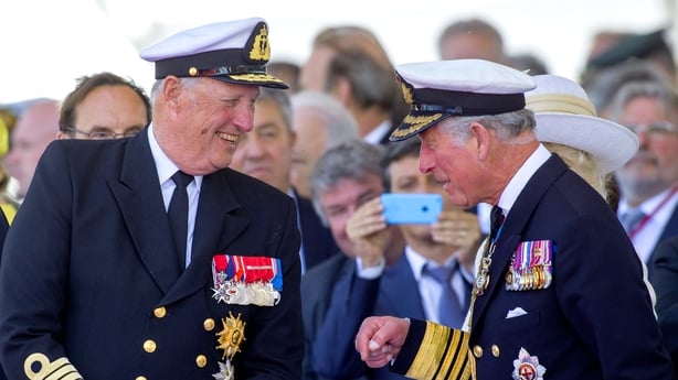 photo shows king harald of norway and the then prince charles laughing together in 2014