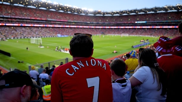 12 August 2026; A Manchester United supporter wearing a Eric Cantona jersey looks on during the pre-season friendly match between Manchester United and Leeds United at Croke Park in Dublin. Photo by Stephen McCarthy/Sportsfile